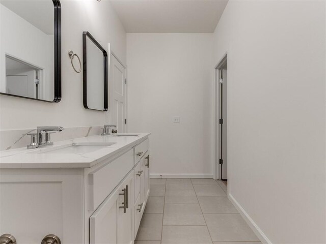 bathroom with vanity and tile patterned floors