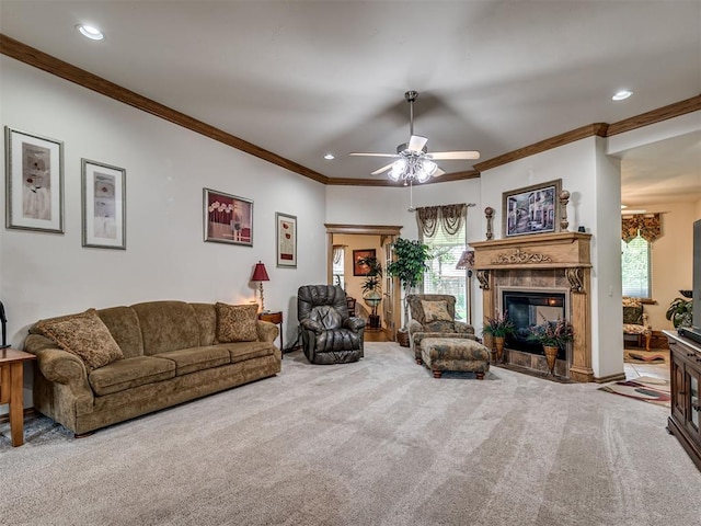 carpeted living room featuring crown molding and ceiling fan