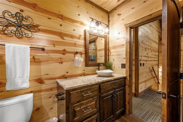 178 Black Jack Trl, Broken Bow, OK 74728 - bathroom with wood walls and vanity