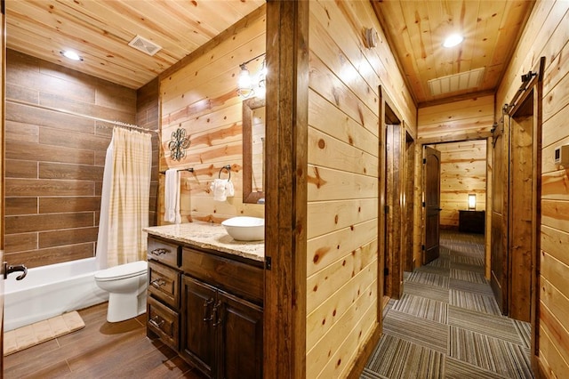 full bathroom featuring toilet, wood ceiling, wooden walls, and shower / tub combo with curtain