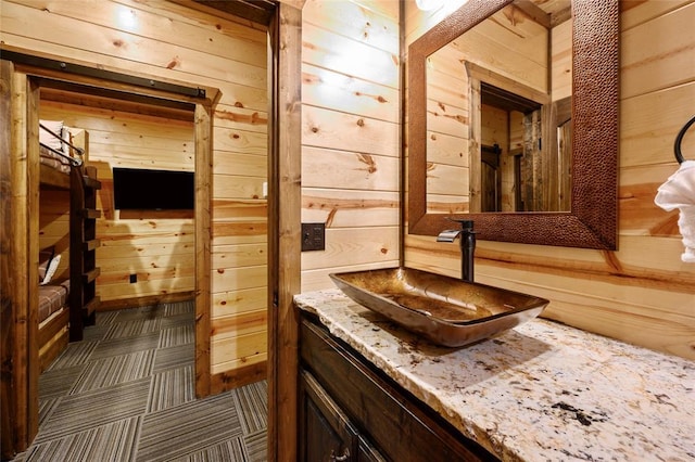 178 Black Jack Trl, Broken Bow, OK 74728 - bathroom with wooden walls, vanity, and a relaxing sauna