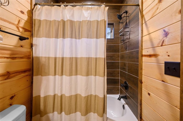 178 Black Jack Trl, Broken Bow, OK 74728 - full bathroom featuring wood walls and shower / bathtub combination with curtain