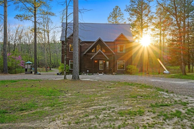 178 Black Jack Trl, Broken Bow, OK 74728 - view of front of house featuring a playground and a metal roof