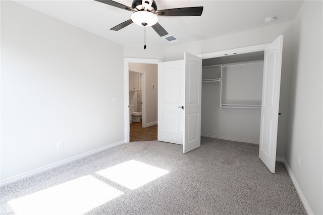 unfurnished bedroom featuring ceiling fan, carpet flooring, and a closet