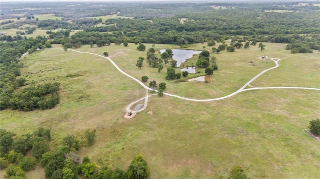 birds eye view of property with a rural view