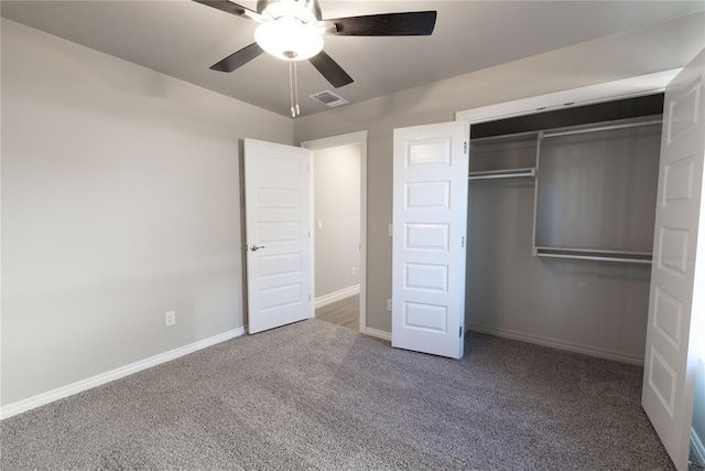 unfurnished bedroom with ceiling fan, a closet, and carpet floors