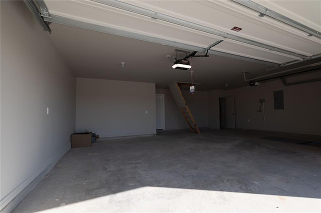 garage with electric panel and a garage door opener