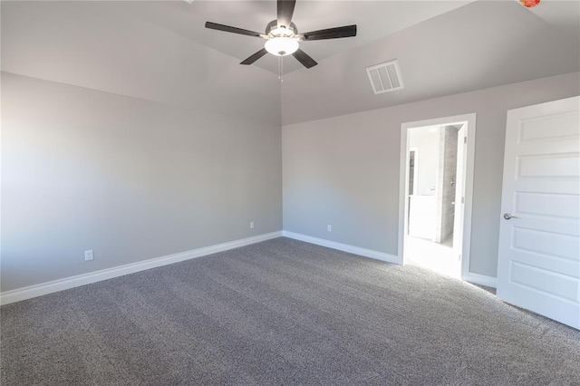 unfurnished room featuring ceiling fan, vaulted ceiling, and carpet