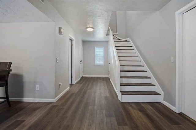 interior space featuring dark wood-type flooring