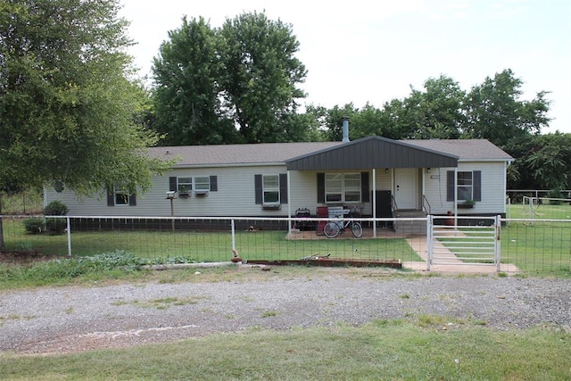 view of front of house featuring a front lawn and a porch