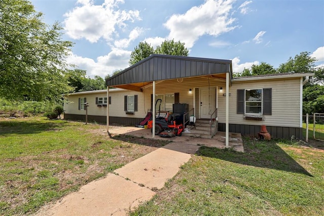 667 County Road 1410th Rd, Ninnekah, OK 73067 - view of front facade featuring a front yard and entry steps