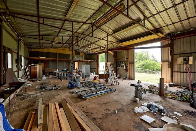 667 County Road 1410th Rd, Ninnekah, OK 73067 - miscellaneous room with a garage and metal wall