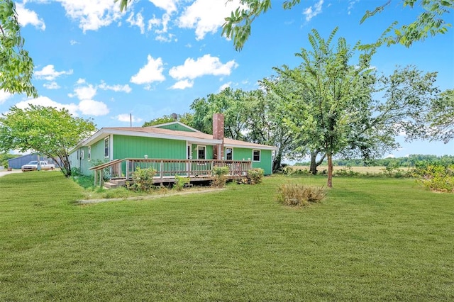 view of yard featuring a wooden deck