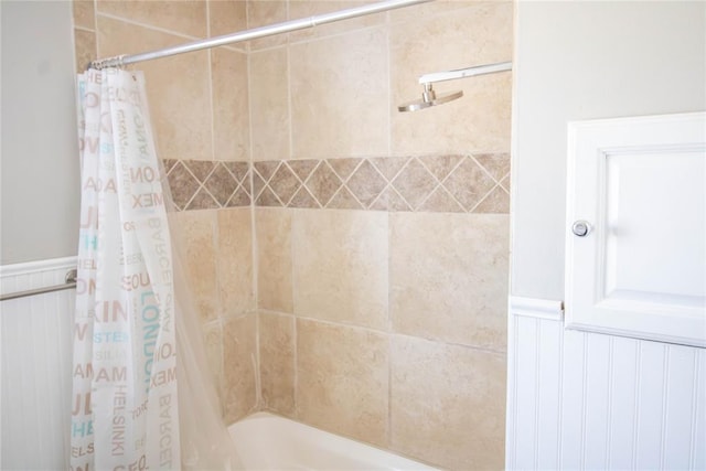 bathroom featuring shower / bath combination with curtain