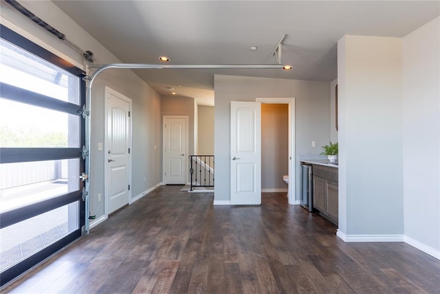 interior space with dark hardwood / wood-style floors