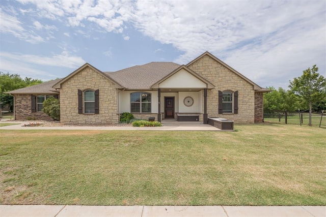 view of front of house with a front lawn