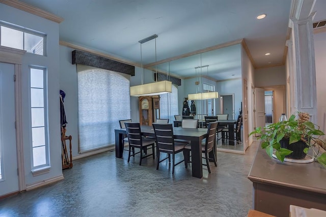 dining area with crown molding