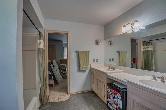 bathroom featuring vanity and shower / bath combination with curtain