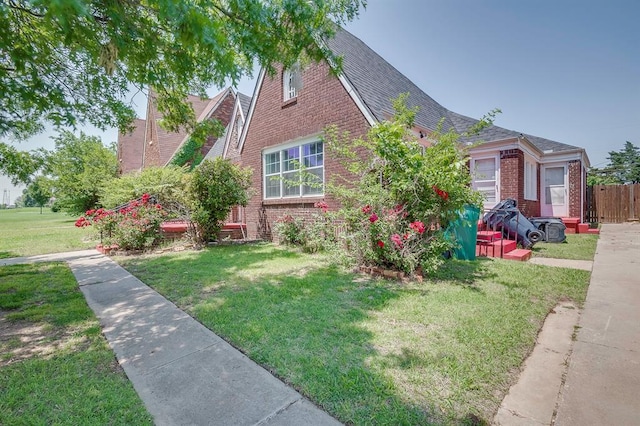 view of front of home with a front yard