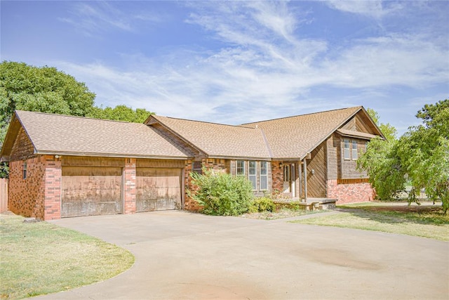 ranch-style house featuring a garage