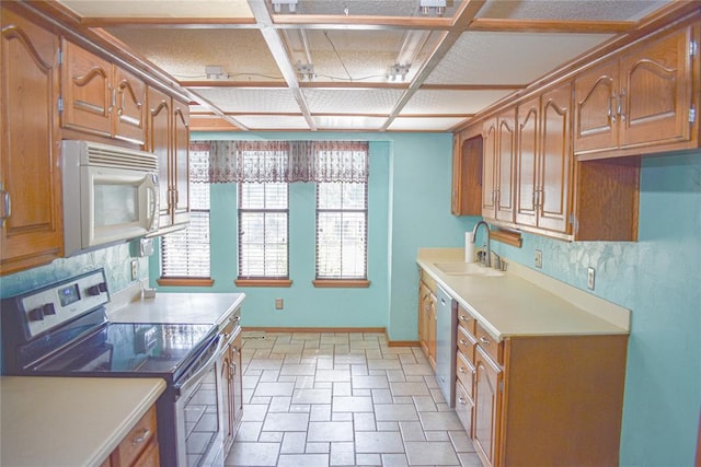 kitchen with stainless steel appliances, tasteful backsplash, and sink