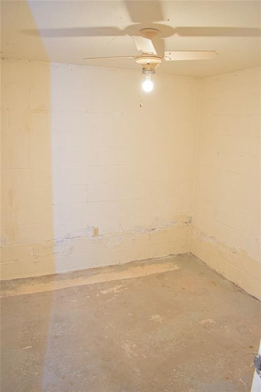 spare room with concrete floors