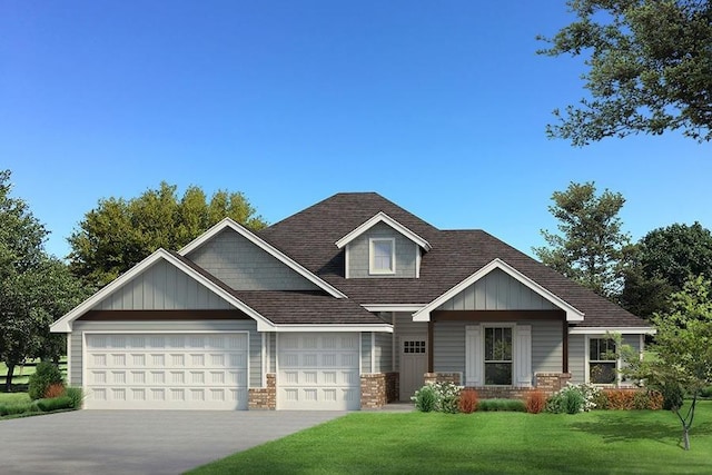 craftsman-style house featuring a garage and a front lawn