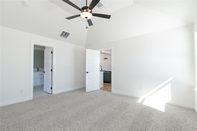 unfurnished bedroom with light colored carpet, visible vents, and baseboards