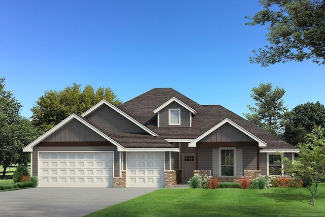 craftsman house with a garage and a front lawn