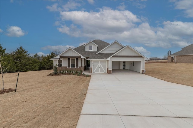 craftsman inspired home with a front yard, a garage, and a porch