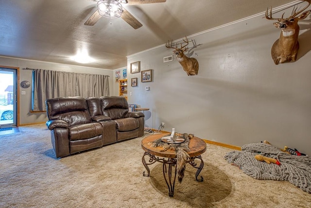 living room with carpet floors and ceiling fan