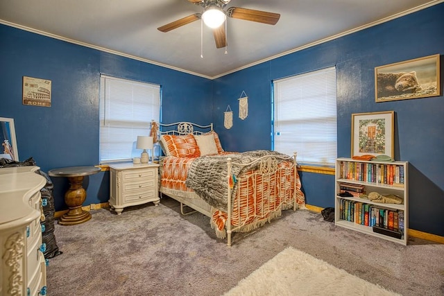 bedroom with ornamental molding, carpet floors, ceiling fan, and multiple windows