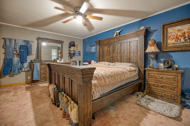 carpeted bedroom with ceiling fan and crown molding