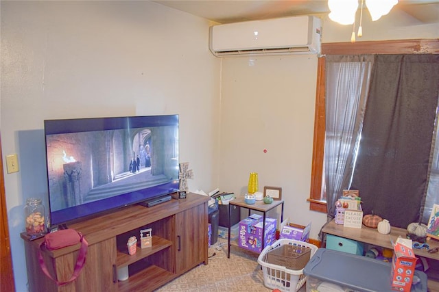 recreation room with a wall mounted air conditioner