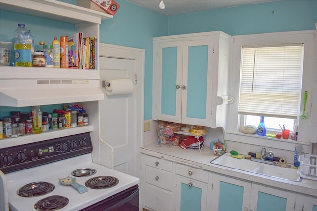 kitchen with a wealth of natural light, sink, ventilation hood, and white electric stove