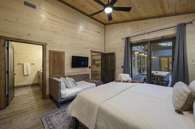 bedroom featuring lofted ceiling, light hardwood / wood-style flooring, ceiling fan, access to exterior, and wood ceiling