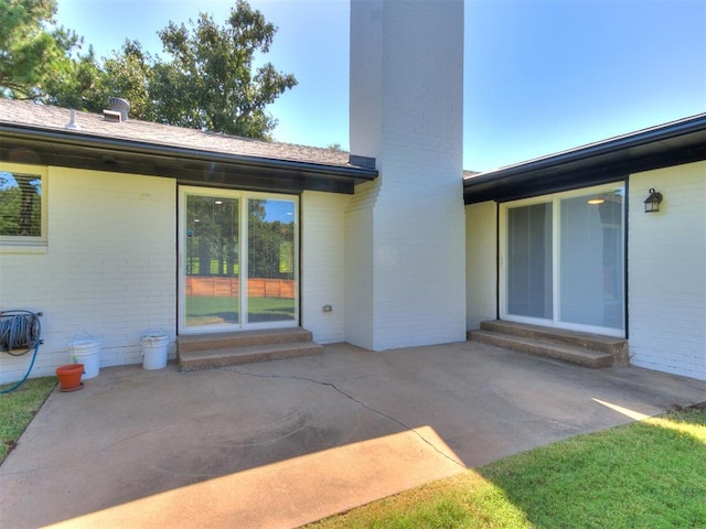 back of house with a patio area