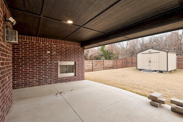 view of patio / terrace featuring a storage shed