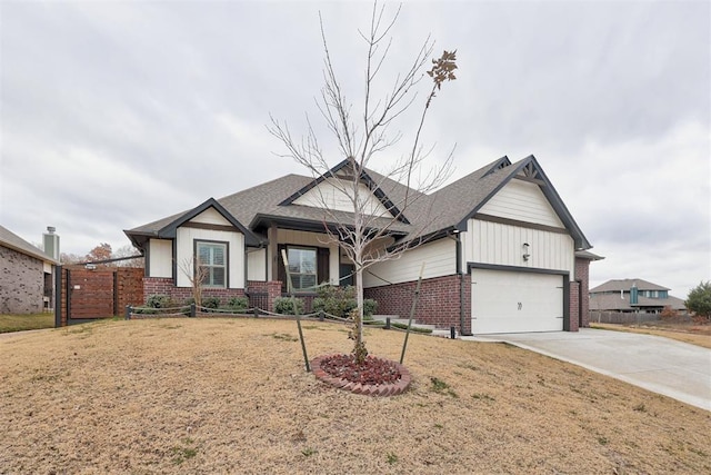 view of front facade with a front yard and a garage