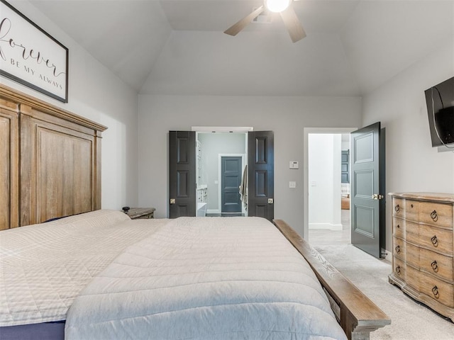 bedroom featuring light carpet, vaulted ceiling, and ceiling fan