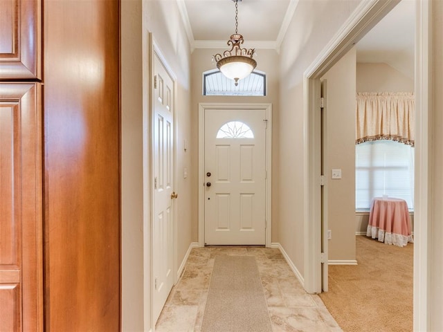 doorway to outside with crown molding and light colored carpet