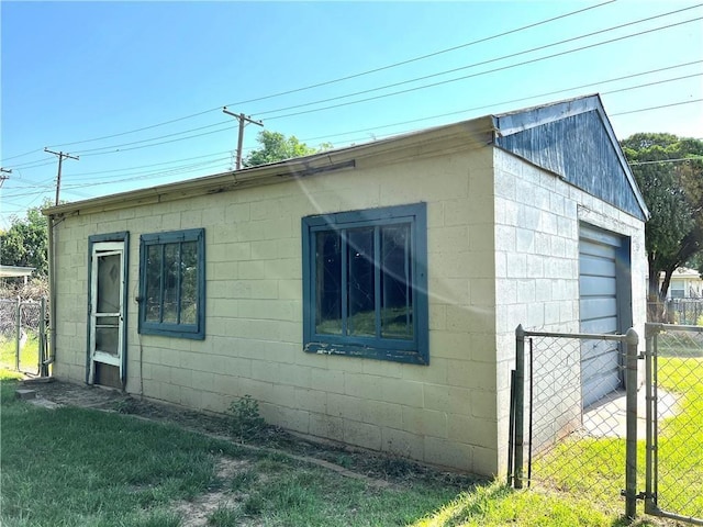 view of side of property with a yard