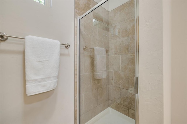 bathroom with an enclosed shower