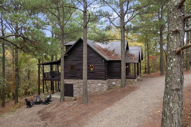 view of home's exterior featuring a wooden deck