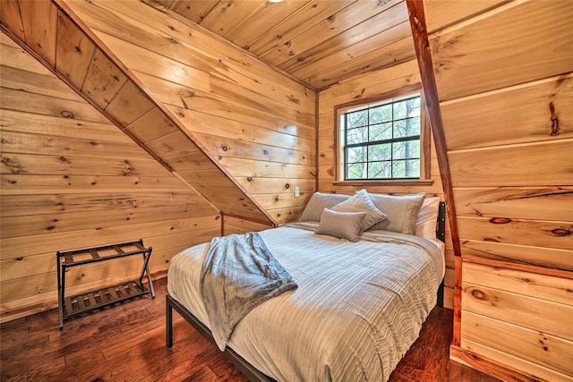 bedroom featuring wooden ceiling, lofted ceiling, dark hardwood / wood-style floors, and wooden walls