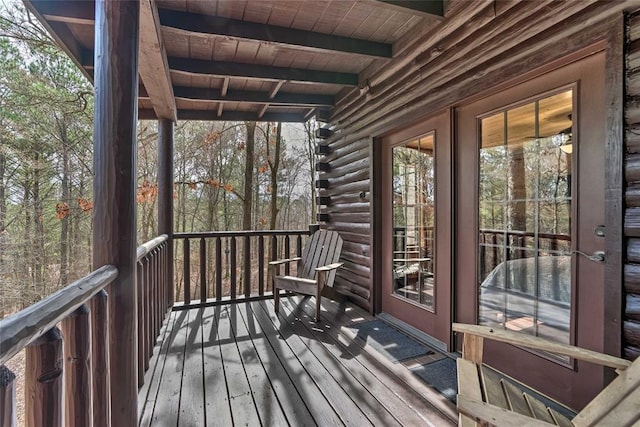 wooden deck featuring french doors