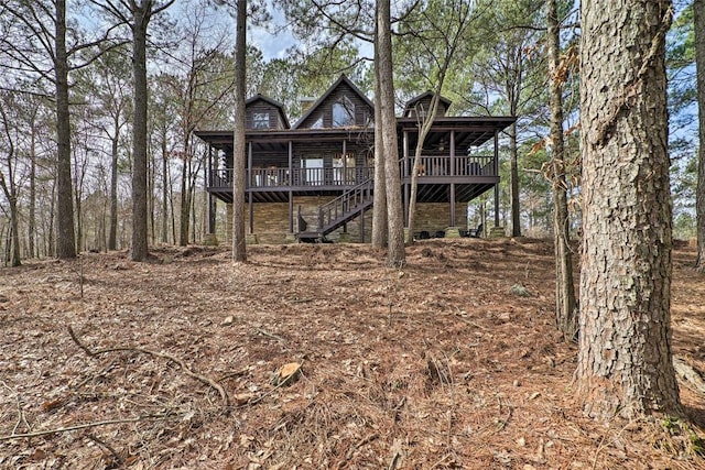 rear view of house with a deck