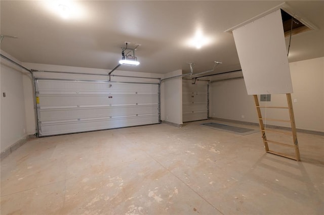 garage featuring a garage door opener