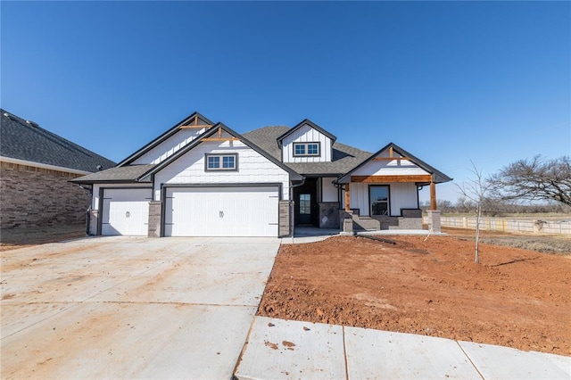 craftsman house featuring a porch and a garage