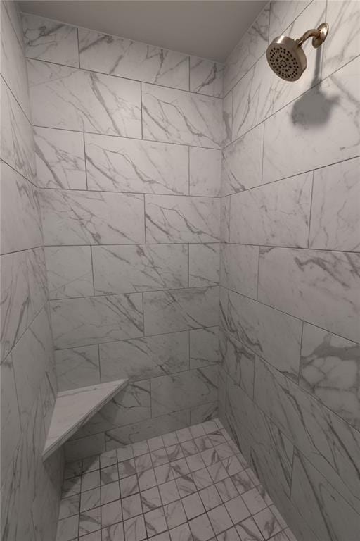 bathroom featuring tiled shower